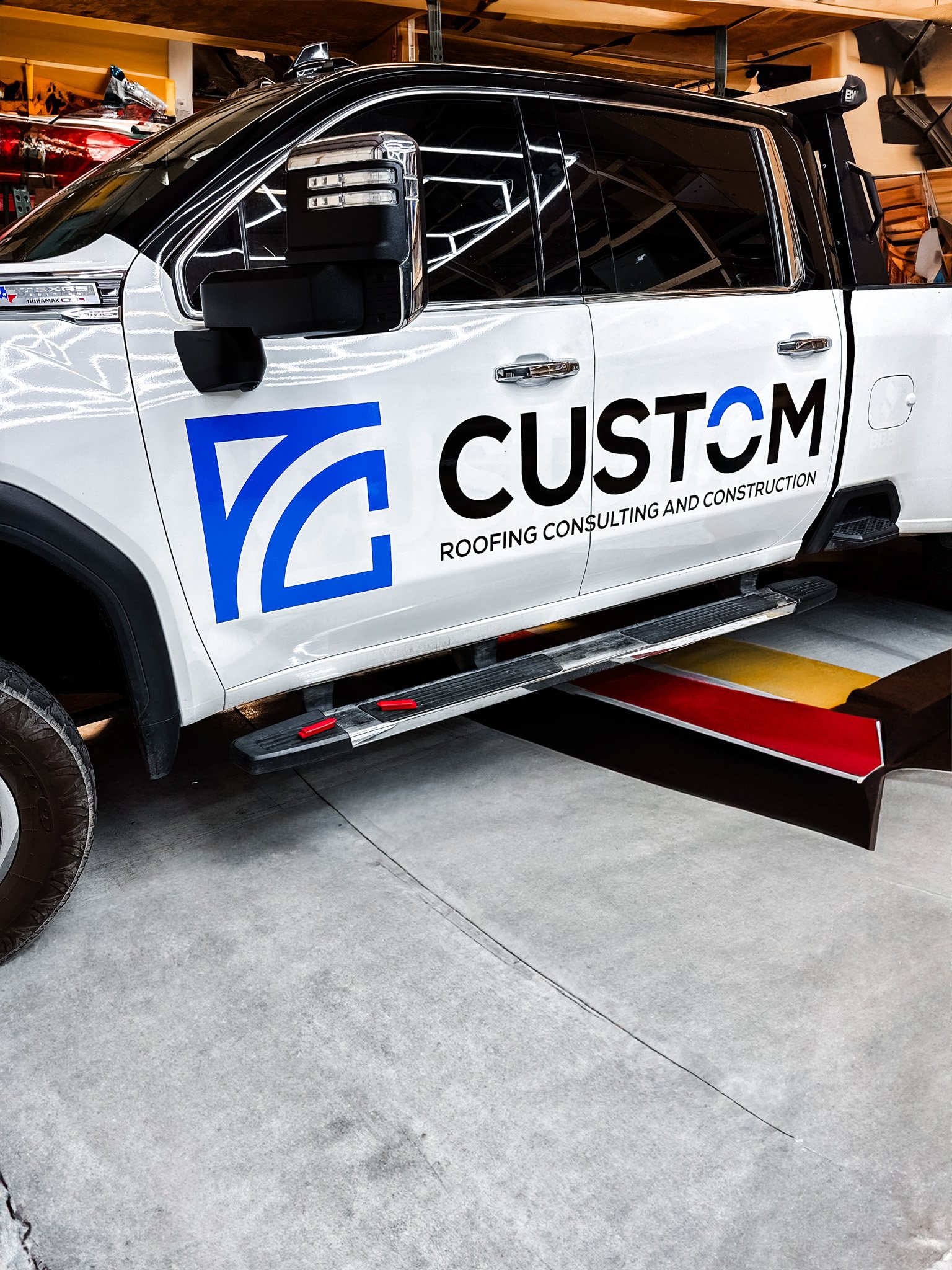 A truck with a custom side wrap done by Innovative Wraps.